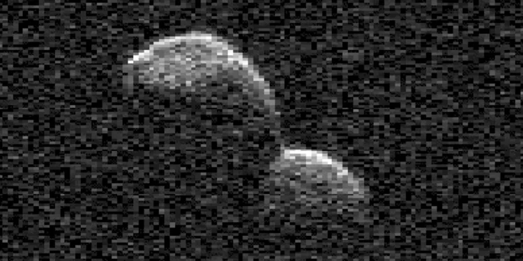 A Snowman-Shaped Asteroid Tumbles Past Earth at Incredible Speed
