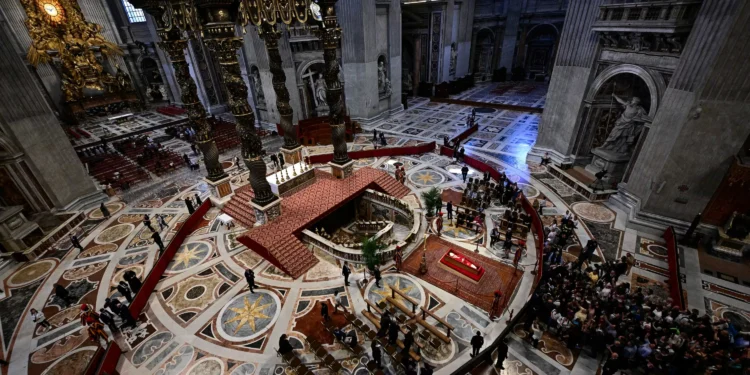 Catholics pay final respects as Pope lies in state at St. Peter’s