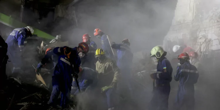 Zelenskyy cuts short S. Africa tour as Russian strike kills 9 in Kyiv