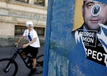 Romania to vote in critical presidential rerun as hard-right nationalist leads