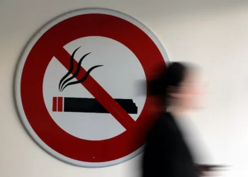 France to outlaw outdoor smoking in most public areas: minister