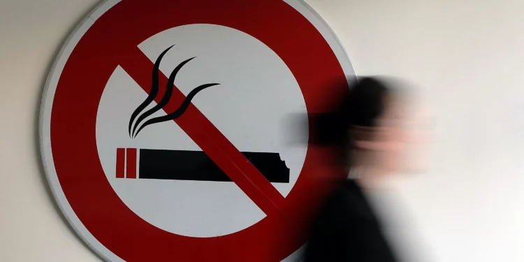 France to outlaw outdoor smoking in most public areas: minister