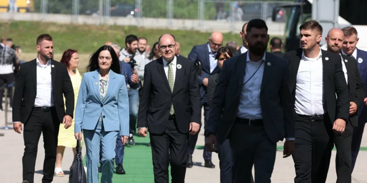 Bosnia’s peace envoy unblocks budget with debt ruling, Serbs cry foul